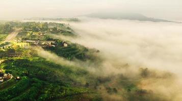 Mountains and fog in thailand photo