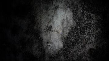 fondo oscuro y aterrador. Muro de hormigón negro oscuro, textura de cemento de fondo de halloween de miedo foto