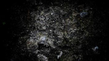 Dark scary background. Dark black concrete wall, scary halloween background cement texture photo