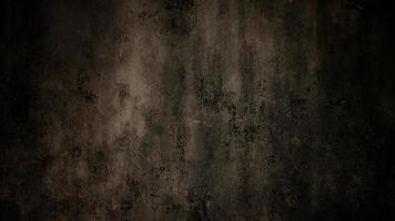 fondo oscuro y aterrador. Muro de hormigón negro oscuro, textura de cemento de fondo de halloween de miedo foto