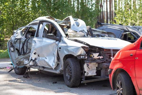 Premium Photo  A lot of broken cars after a traffic accident in the  parking lot of a repair station on the street car body damage workshop  outdoors sale of insurance cars