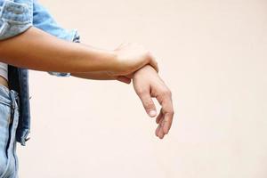 Asian woman having pain in her arm photo