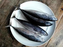 Fresh fish on a plate. Traditional Indonesian culinary food photo