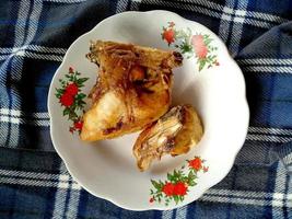 Ayam goreng or fried chicken. Indonesian culinary food. photo