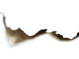 Paper burns on white backgrounds photo