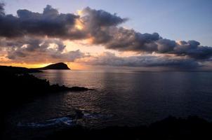 Dramatic sunset over ocean photo