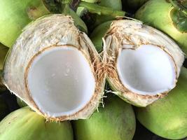 Young fresh coconut with white flesh for summer fruit. photo