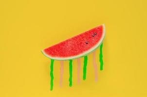 Red slice watermelon with pink and green poster color photo