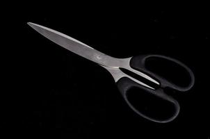 Metal Scissors on black photo