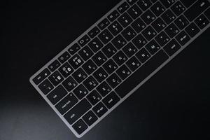 teclado bluetooth con diseño en inglés y ruso foto