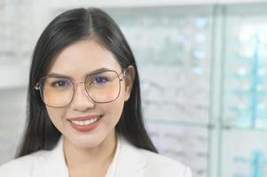 Portrait of ophthalmologist in optical center, eyecare concept. photo