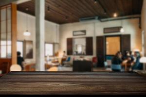 Empty top of wooden shelves on coffee shop ,tree front view background. For product display blur background image, for product display montage. photo