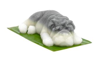 Thai desserts,gray shape-dog jelly on banana leaf,isolated on white background photo