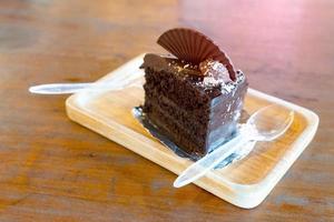 Chocolate cake on wooden tray photo