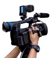 hand holding a video camera isolated on white background,include clipping path photo