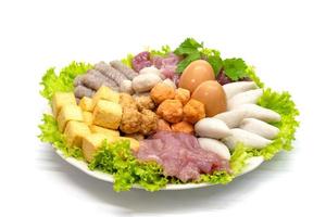various fresh vegetables for sukiyaki on white background photo