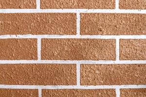 Brown bricks wall pattern background photo