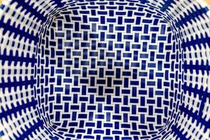 white blue plastic woven basket textured photo