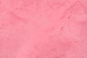 Texture of a concrete wall with cracks and scratches which can be used as a background photo