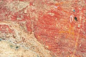 textura de una pared de hormigón con grietas y arañazos que se pueden utilizar como fondo foto