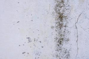 textura de una pared de hormigón con grietas y arañazos que se pueden utilizar como fondo foto