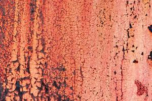 Metal texture with scratches and cracks which can be used as a background photo