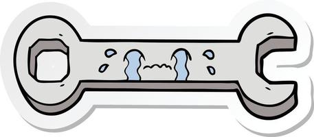 sticker of a cartoon crying spanner vector