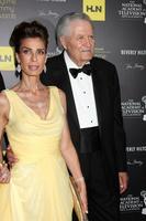 LOS ANGELES, JUN 23 - Kristian Alfonso, John Aniston arrives at the 2012 Daytime Emmy Awards at Beverly Hilton Hotel on June 23, 2012 in Beverly Hills, CA photo