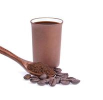 Coffee beans with ground coffee isolated on white background photo