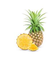 pineapple and pineapple slice with leaves isolated on white background photo