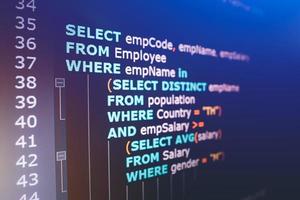 SQL or Structured Query Language code on computer monitor. Example of SQL code to query data from a database. photo