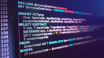 SQL or Structured Query Language code on computer monitor. Example of SQL code to query data from a database. photo