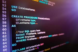 SQL or Structured Query Language code on computer monitor. Example of SQL code to query data from a database. photo