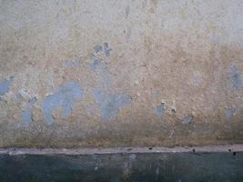 Old cement or concrete outdoor wall with stains and moldy for background. photo