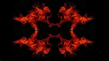 A beautiful flame shaped as imagined. like from hell, showing a dangerous and fiery fervor, black background photo