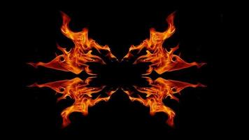 A beautiful flame shaped as imagined. like from hell, showing a dangerous and fiery fervor, black background photo