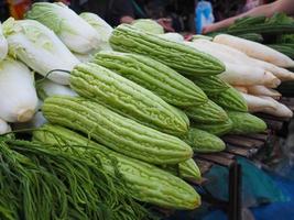 Fresh bitter melon for sale in the market photo