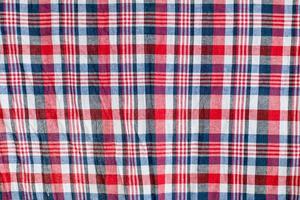 Fabric for men in Asia Wear it in the shower or wear it while relaxing. The men's tartan is a beautiful and colorful art in Malaysia, Indonesia, and Thailand. Close-up photo with horizontal background