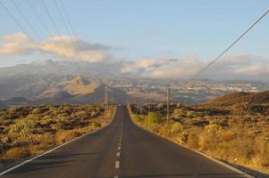 Asphalt Road in the Desert photo