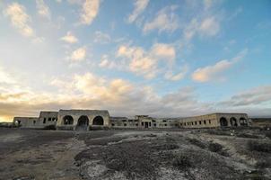 Abandoned buildings in the desert photo