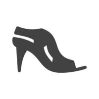 sandalias elegantes glifo icono negro vector