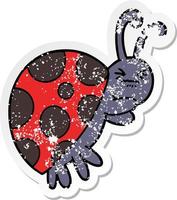 distressed sticker of a cartoon ladybug vector