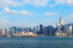 Hong Kong skyline with boats photo