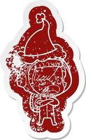 cartoon distressed sticker of a astronaut woman explaining wearing santa hat vector