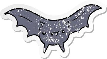 distressed sticker of a cartoon bat vector