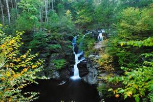 Waterfall in mountain photo