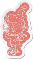cartoon distressed sticker of a staring man wearing santa hat vector