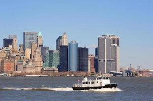 New York City Manhattan skyscrapers and boat photo