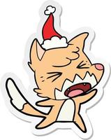 angry sticker cartoon of a fox wearing santa hat vector