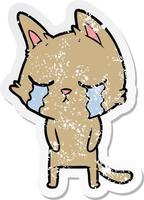 distressed sticker of a crying cartoon cat vector